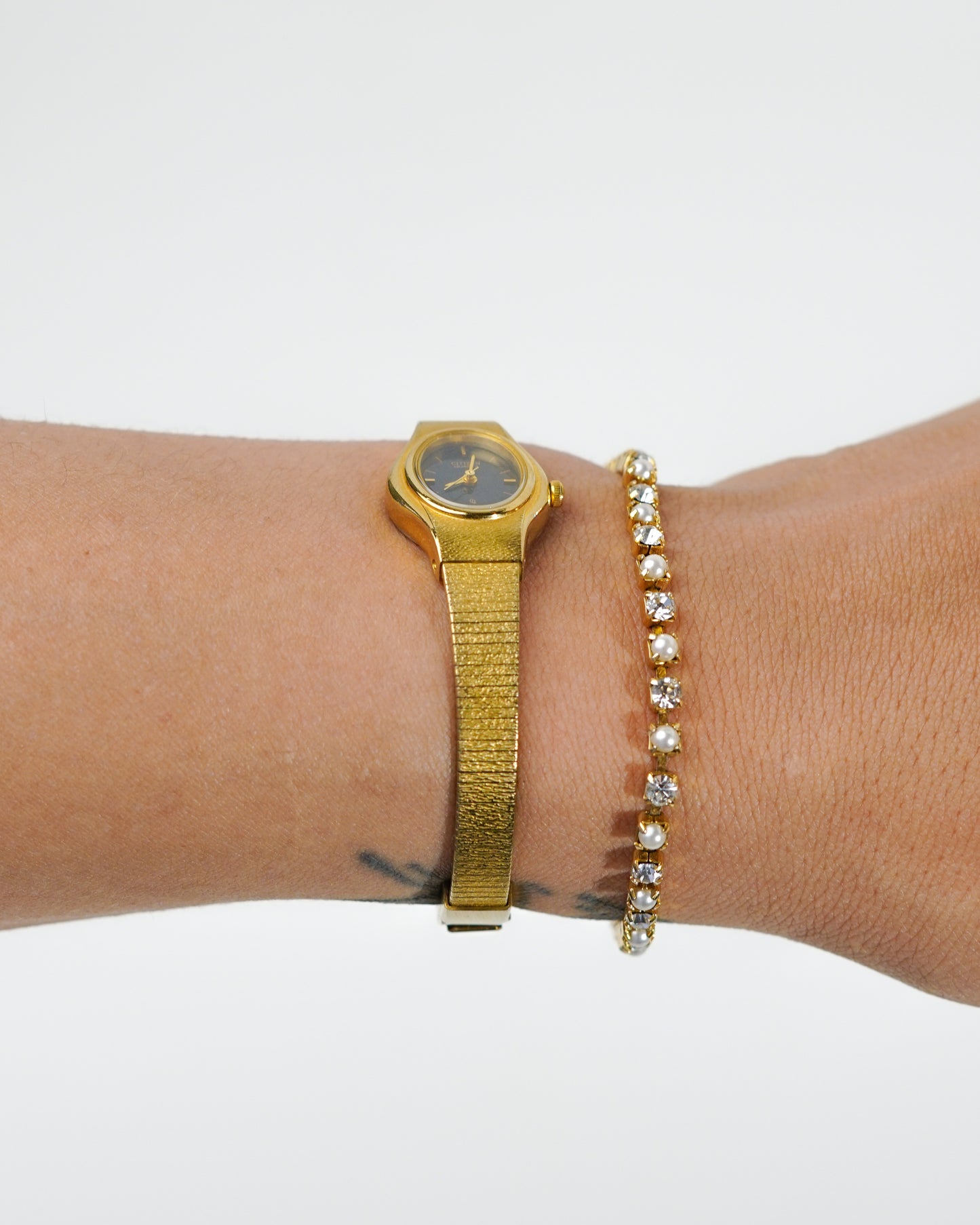 1990's Black & Gold Oval Citizen