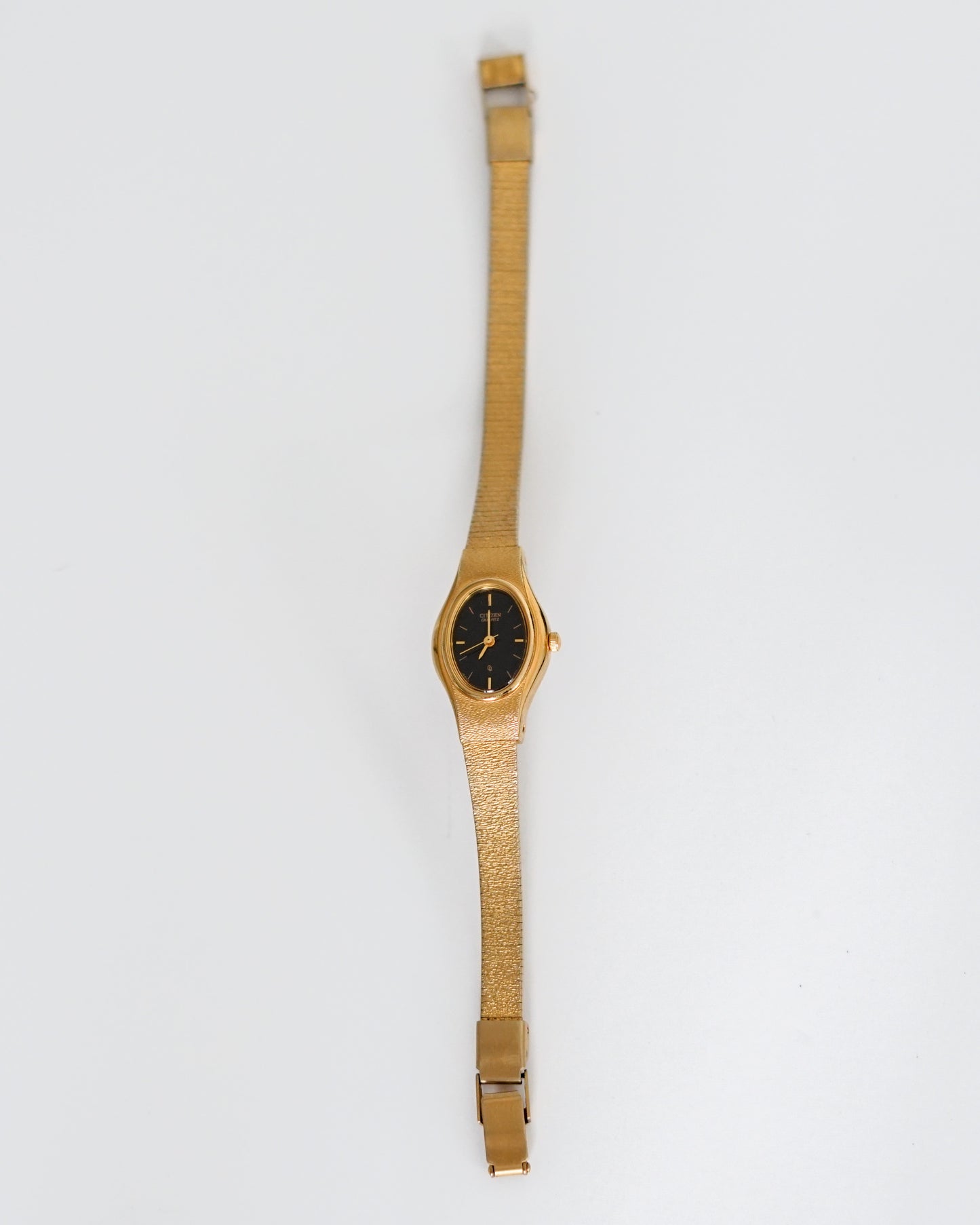 1990's Black & Gold Oval Citizen